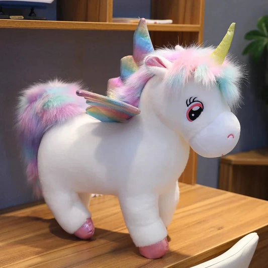 Peluche licorne arc-en-ciel blanche avec ailes et corne dorée