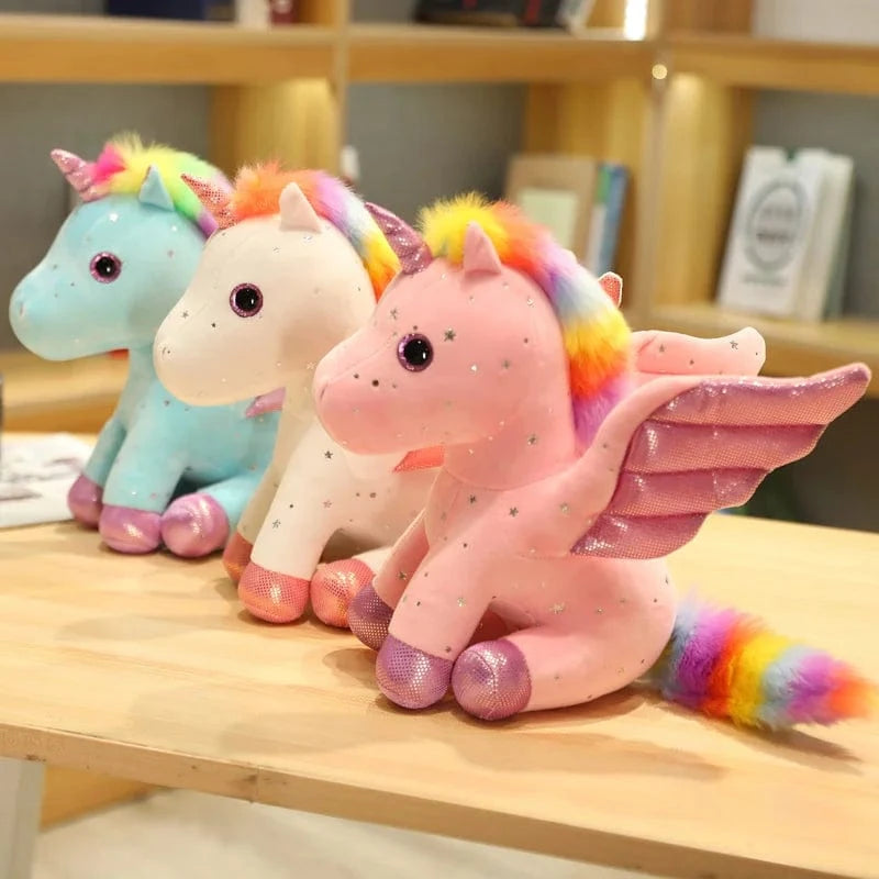 Peluche licorne bleu à crinière arc-en-ciel magique