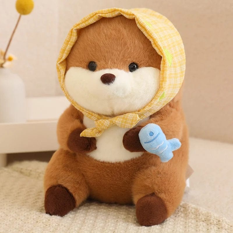 Peluche loutre avec un voile qui tient un poisson coloré Bleu