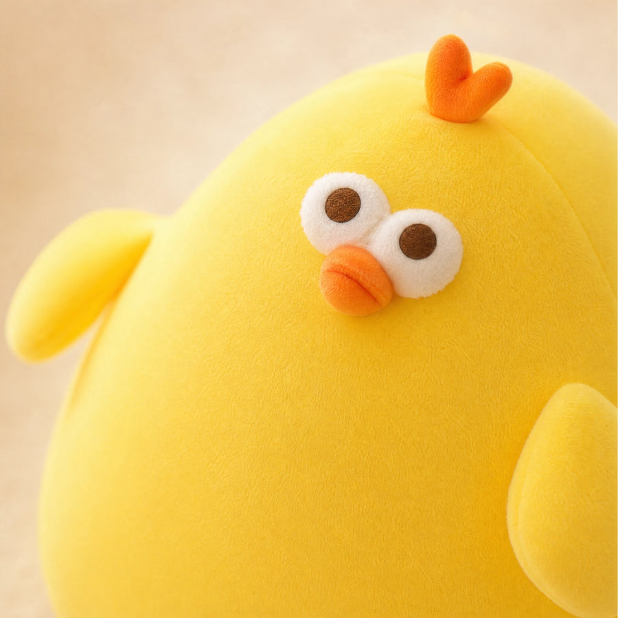 Peluche Poussin Géant Jaune Forme Rebondie et Pattes Orange - Détail matière