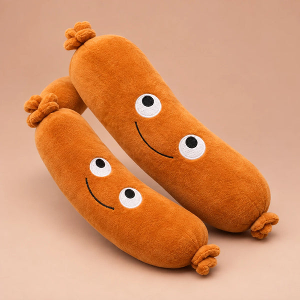 Peluche saucisson géante 70 cm avec petits bras et sourire - Fond beige rosé, autre angle
