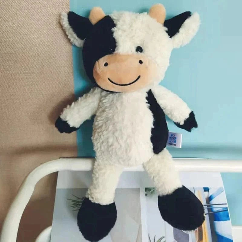 Peluche vache mignonne à fourrure blanche