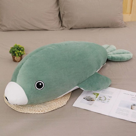 Peluche verte aux grands yeux en forme de phoque